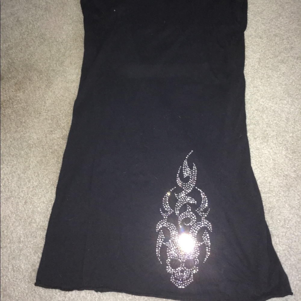 Black shirt with rhinestone skull. Size small.
